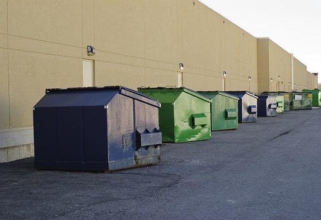 dumpsters arranged tidily on the construction site in Bastrop